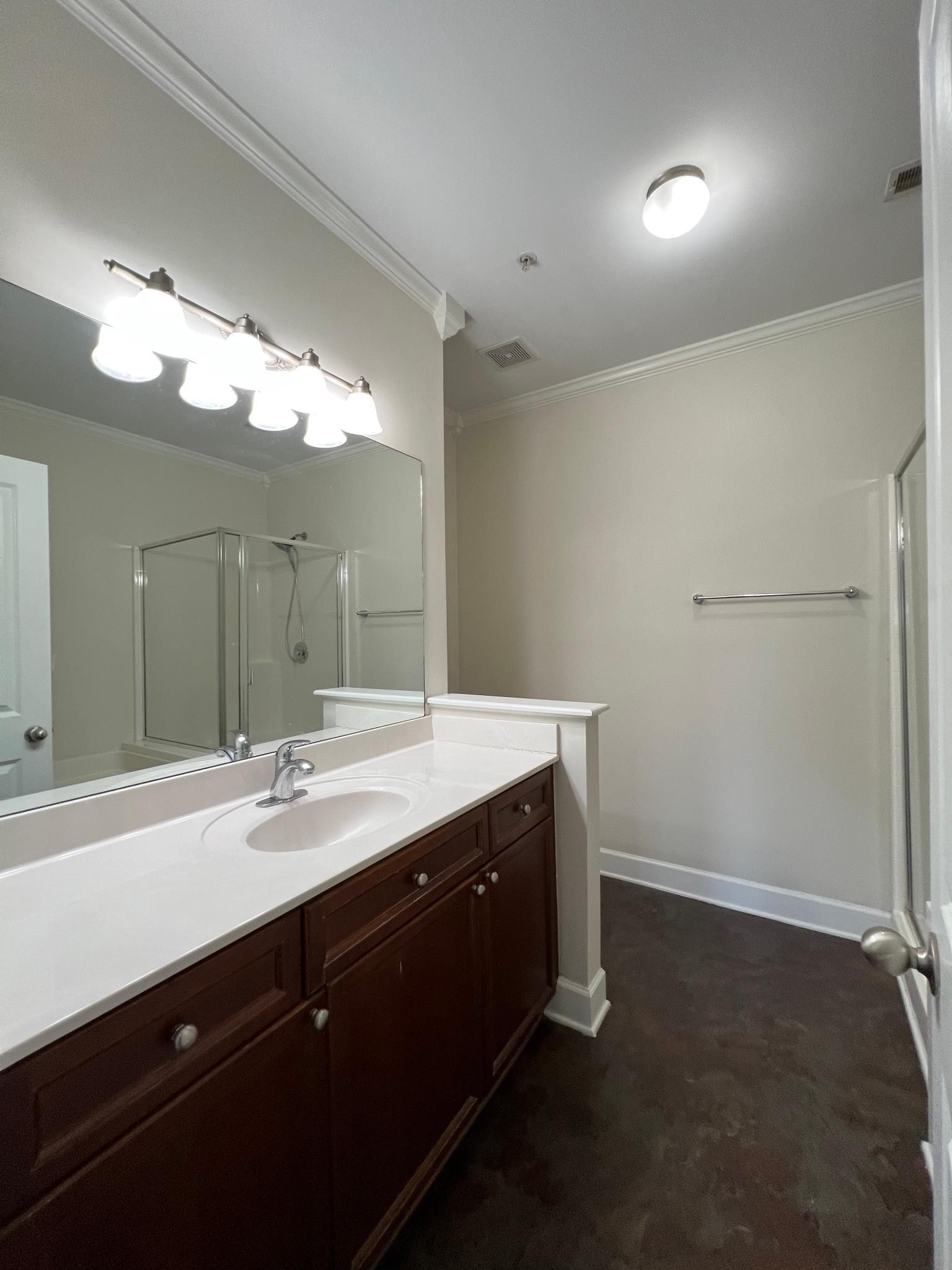 7230 Althorp Way, Unit W7 Nashville, TN 37211 - Photo 17 of 21 a bathroom with a double vanity sink and mirror