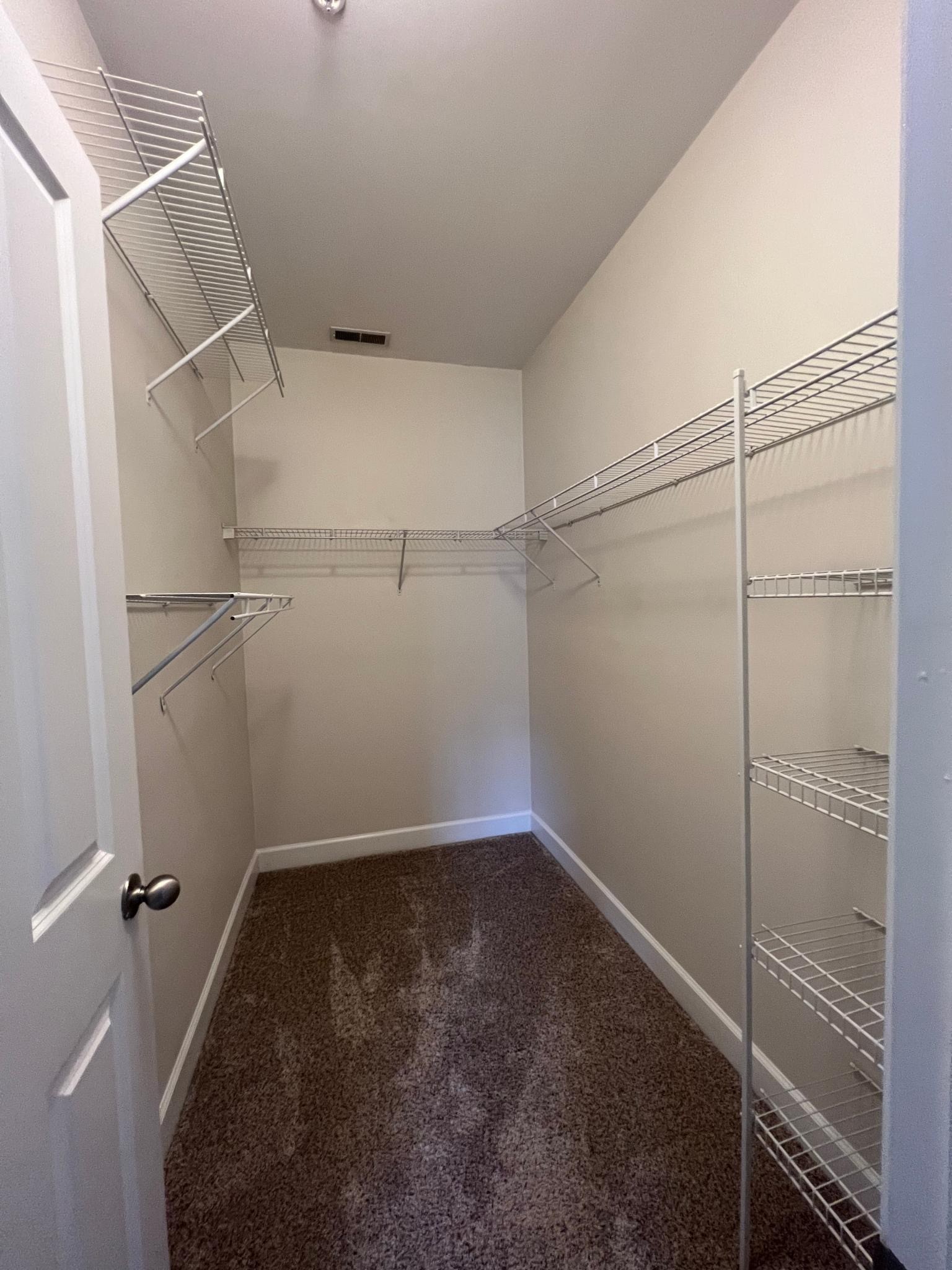 7230 Althorp Way, Unit W7 Nashville, TN 37211 - Photo 20 of 21 a view of a room with racks on the wall