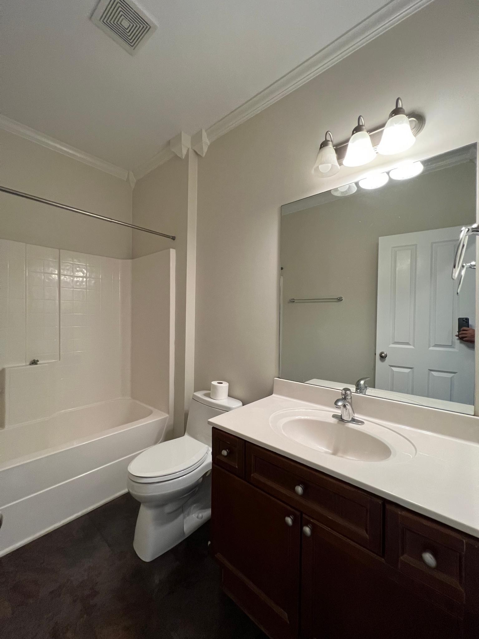 7230 Althorp Way, Unit W7 Nashville, TN 37211 - Photo 9 of 21 a bathroom with a sink a toilet and shower