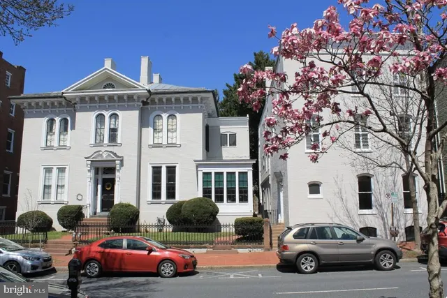 a car parked in front of a house