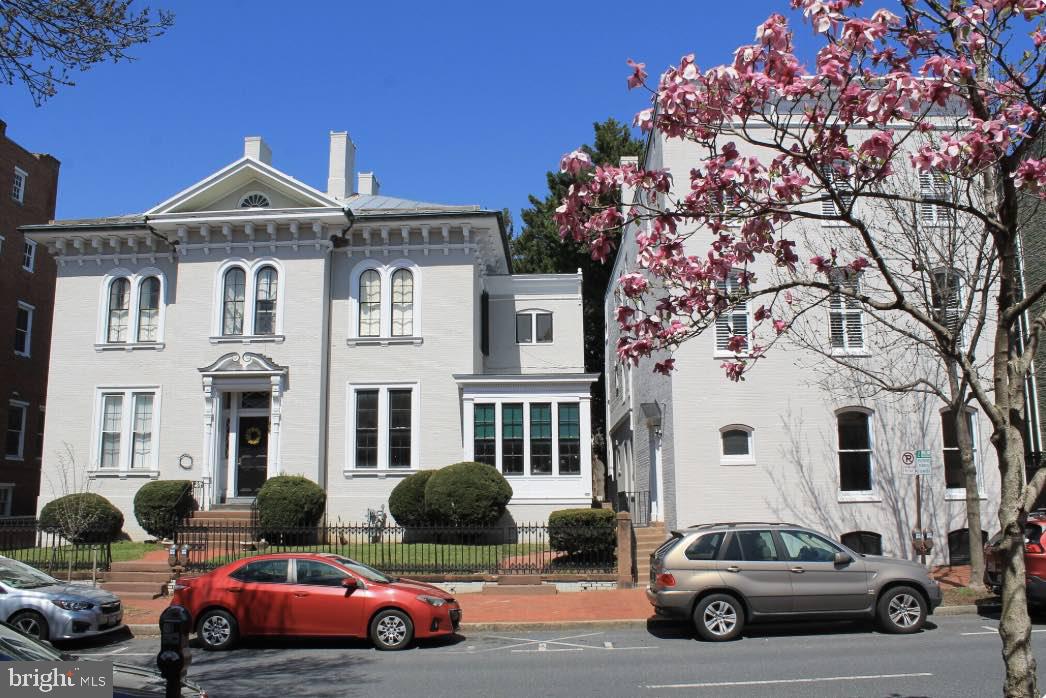 a car parked in front of a house