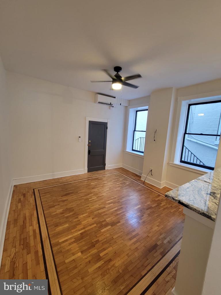 105 East Church Street, Unit 6 Frederick, MD 21701 - Photo 2 of 5 a view of an empty room and window