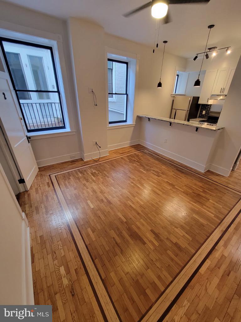 105 East Church Street, Unit 6 Frederick, MD 21701 - Photo 3 of 5 a view of an empty room and a window