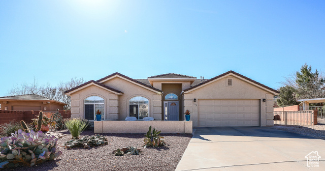 124 East 710 S Circle Ivins, UT 84738 - Photo 1 of 1 View of front of home with a garage
