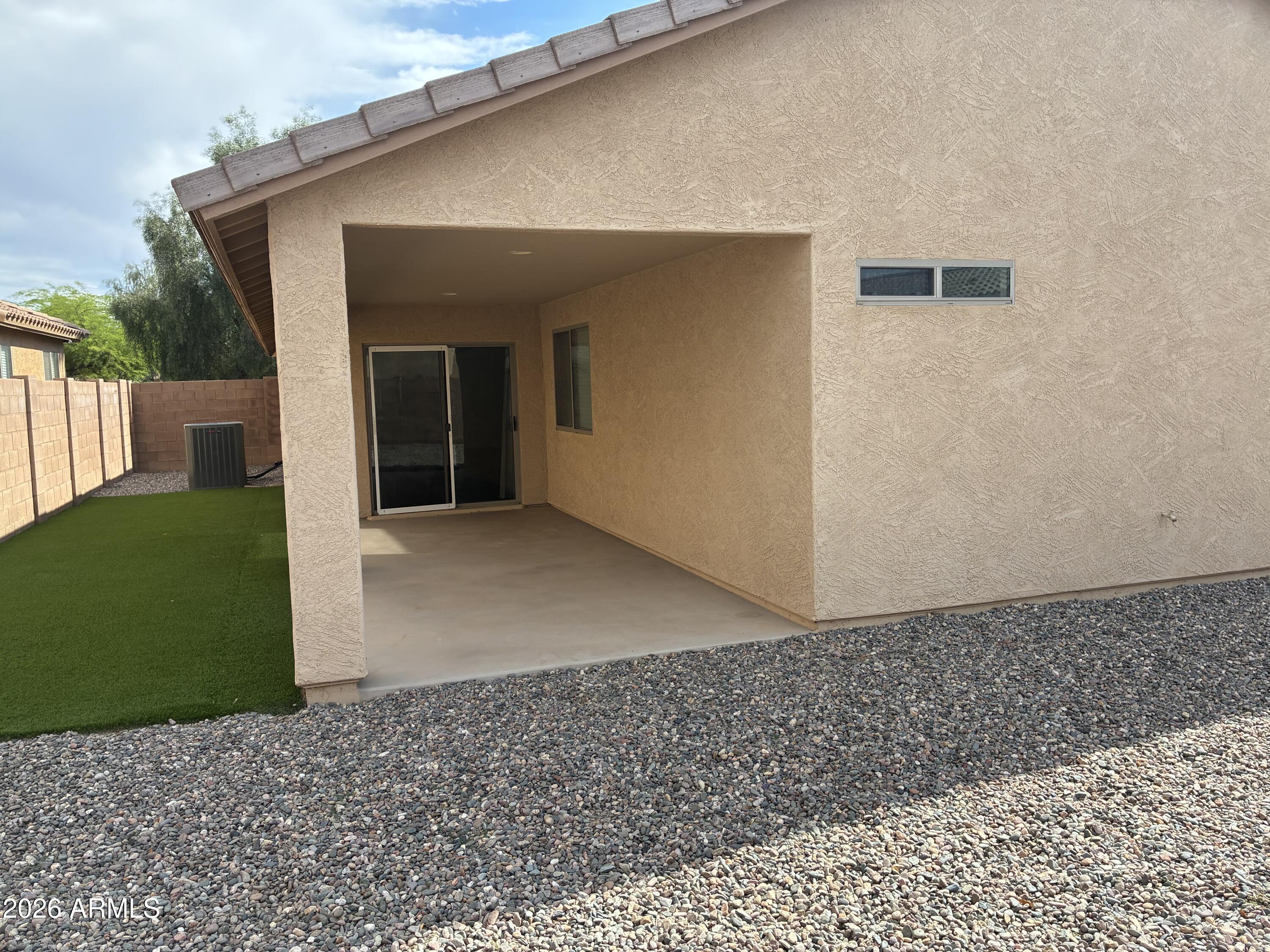 4634 West Fremont Rd. Laveen, AZ 85339 - Photo 32 of 46 a view of a house with a backyard
