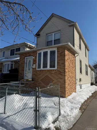 a front view of a house with street