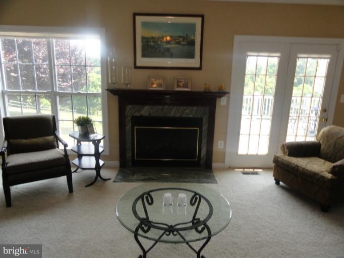 723 Sunpoint Road Davidsonville, MD 21035 - Photo 11 of 30 View of family room overlooking deck