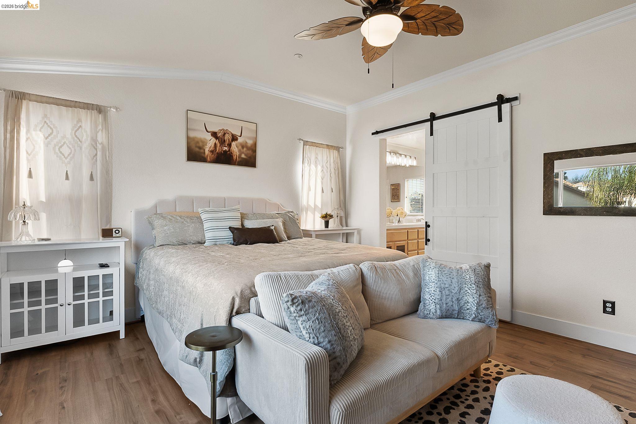 606 Ralston Court Brentwood, CA 94513 - Photo 17 of 32 a bedroom with a bed couch and a window