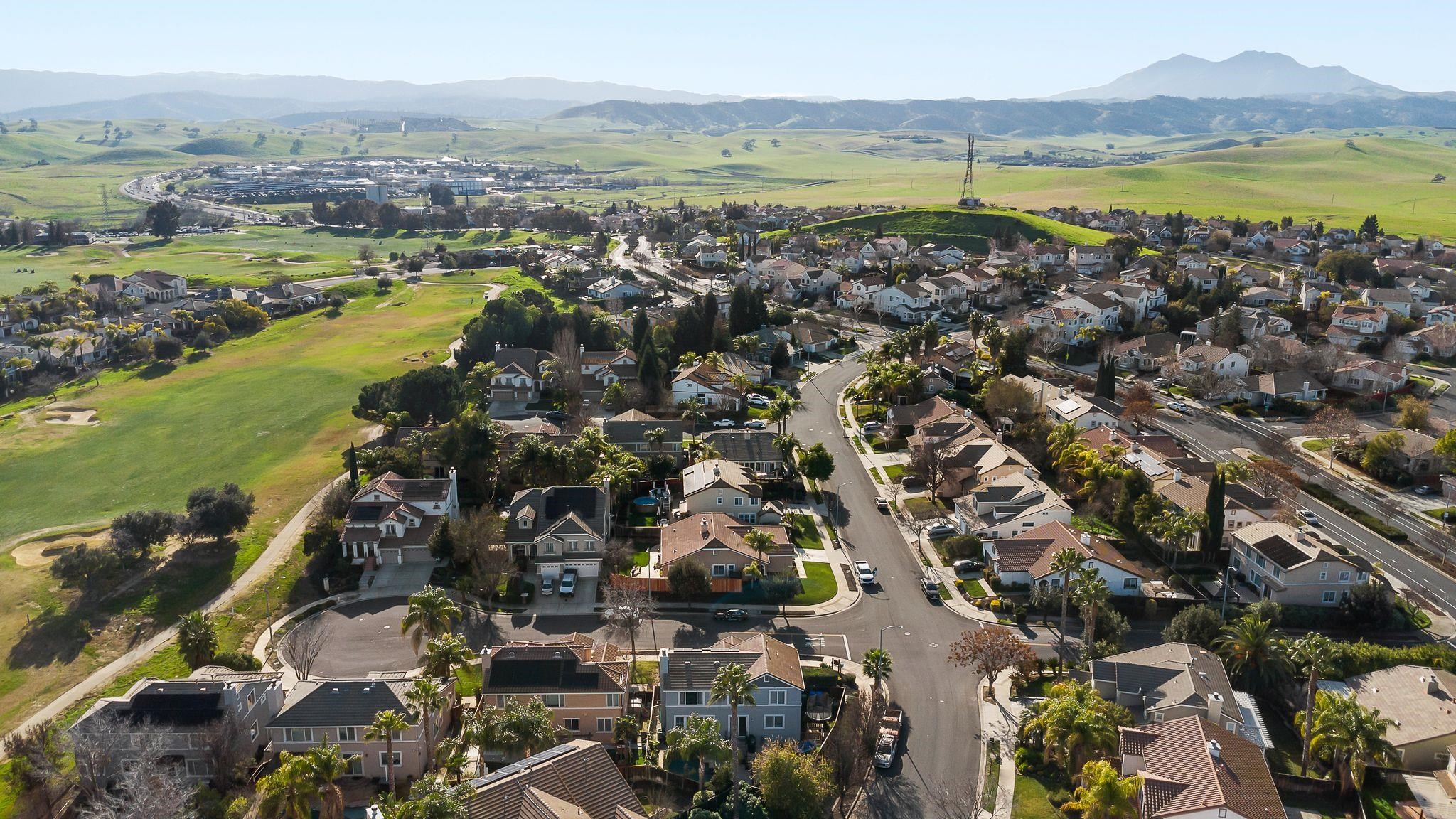 606 Ralston Court Brentwood, CA 94513 - Photo 31 of 32 Aerial view of residential area featuring a mountainous background