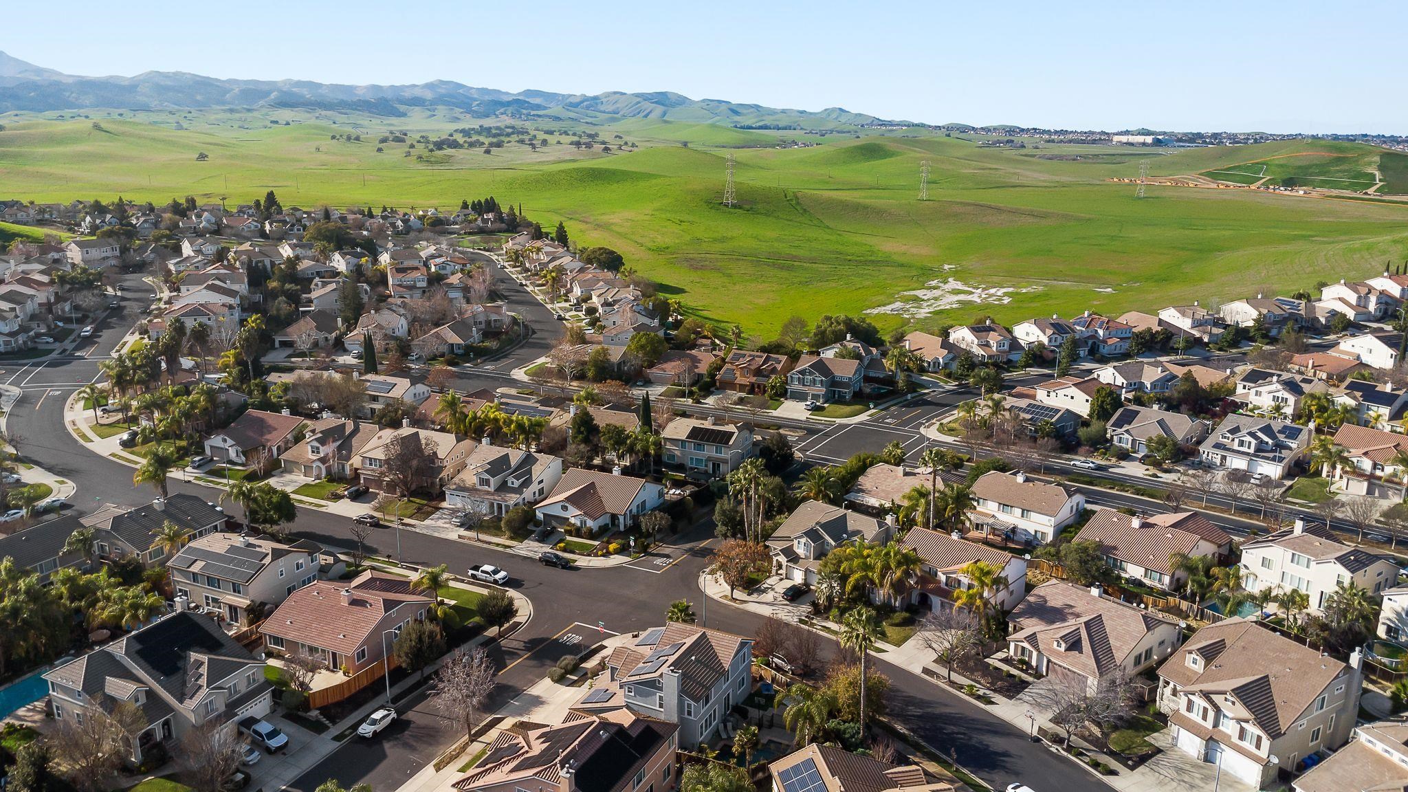 606 Ralston Court Brentwood, CA 94513 - Photo 32 of 32 Drone / aerial view of a mountainous background