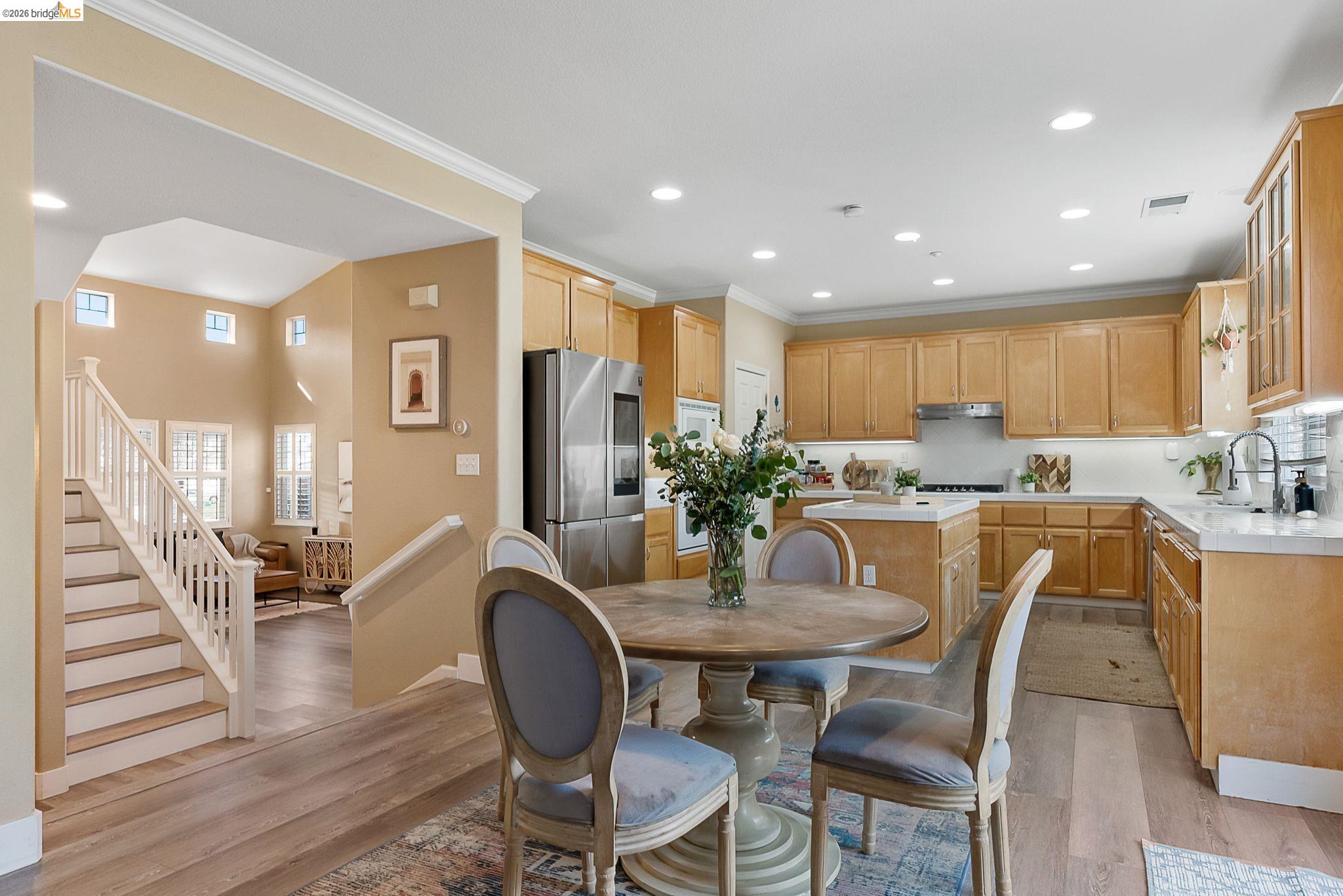 606 Ralston Court Brentwood, CA 94513 - Photo 8 of 32 a view of a dining room with furniture and wooden floor