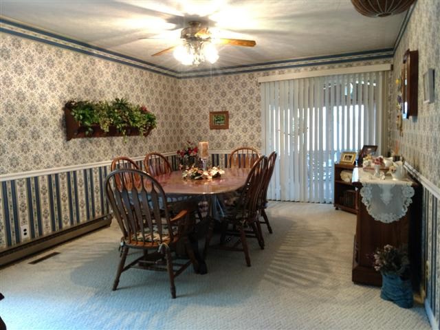 702 Westmore Road Davis, IL 61019 - Photo 3 of 15 a dining room with furniture and window