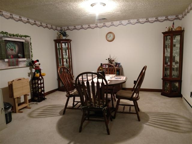 702 Westmore Road Davis, IL 61019 - Photo 4 of 15 a view of a dining room with furniture and wooden floor