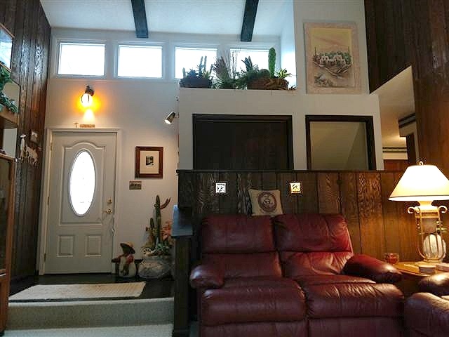 702 Westmore Road Davis, IL 61019 - Photo 8 of 15 a living room with furniture and a flat screen tv