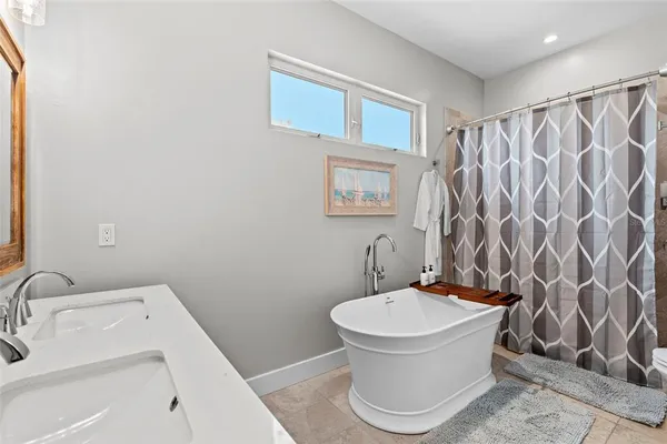 a bathroom with a sink and a toilet