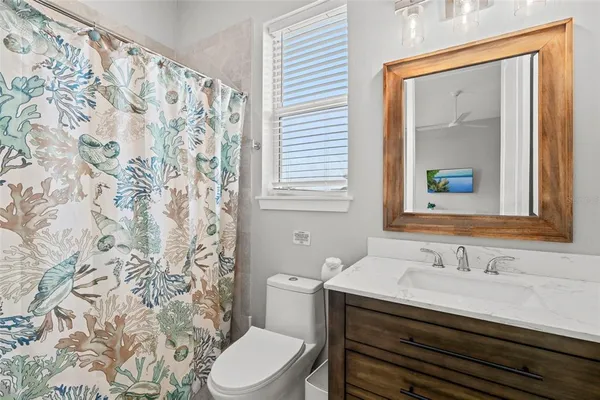 a bedroom with a bed and a cabinets