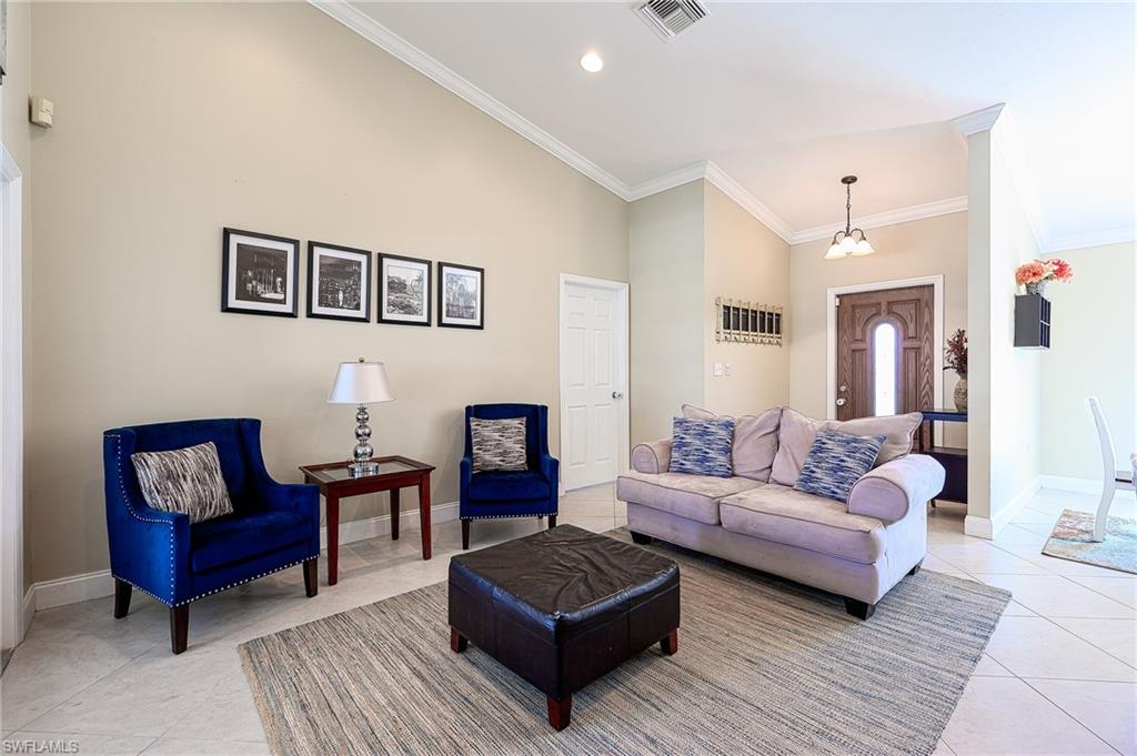 10058 Boca Circle Naples, FL 34109 - Photo 16 of 33 a living room with furniture