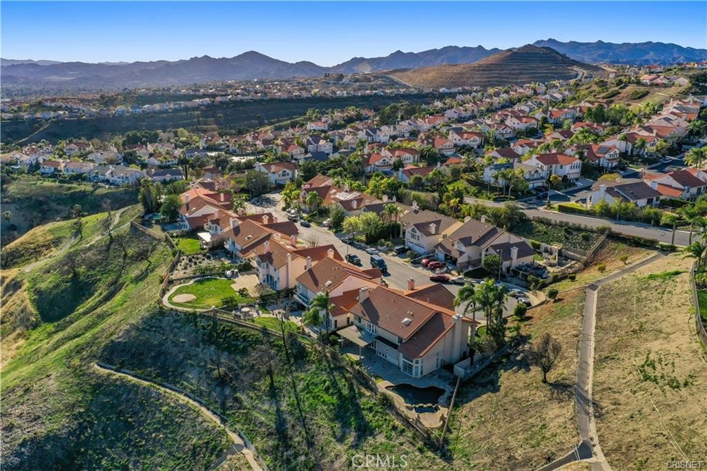 19584 Shadow Glen Circle Porter Ranch, CA 91326 - Photo 66 of 72 an aerial view of residential house with an outdoor space and seating