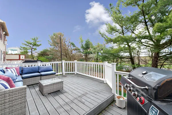 a view of a balcony with furniture