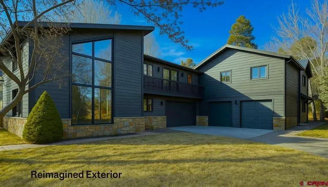 a view of a house with a swimming pool