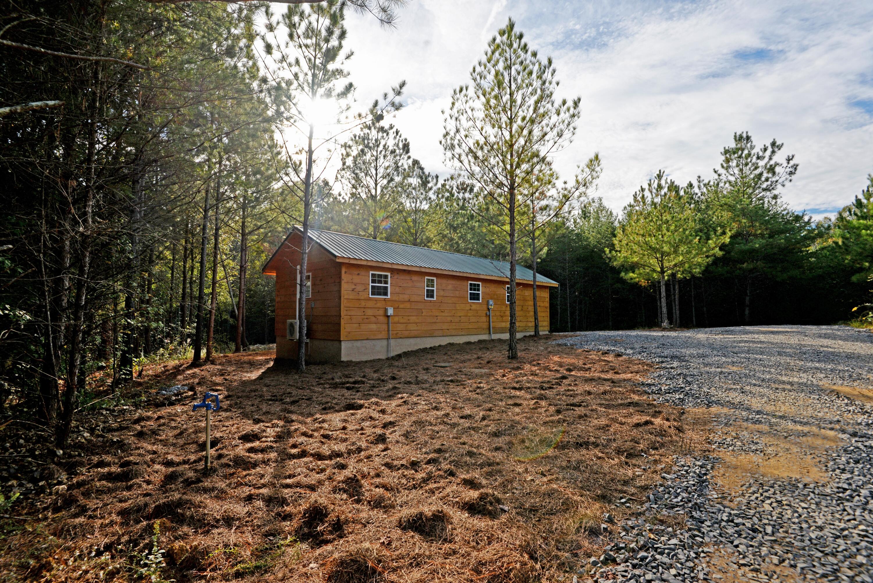 165 Mull Road Benton, TN 37307 - Photo 4 of 26 Rear view (entering) (med)