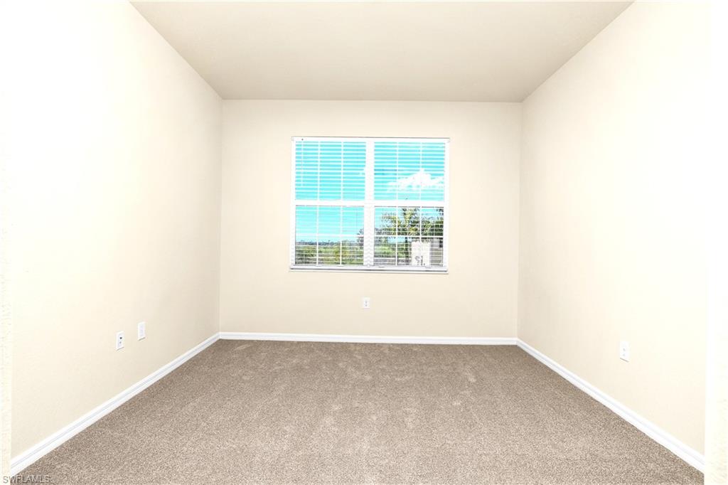 2754 Citrus Street Naples, FL 34120 - Photo 15 of 34 an empty room with a window