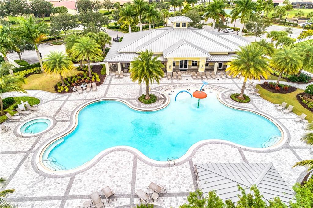 2754 Citrus Street Naples, FL 34120 - Photo 22 of 34 an aerial view of a house with swimming pool and patio