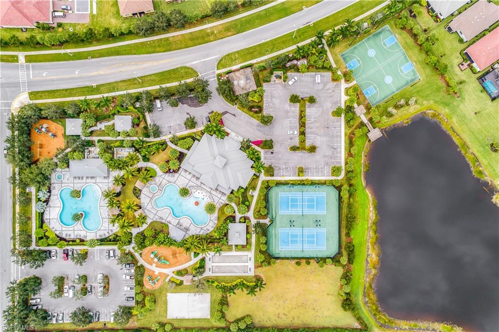 2754 Citrus Street Naples, FL 34120 - Photo 24 of 34 an aerial view of residential houses with outdoor space