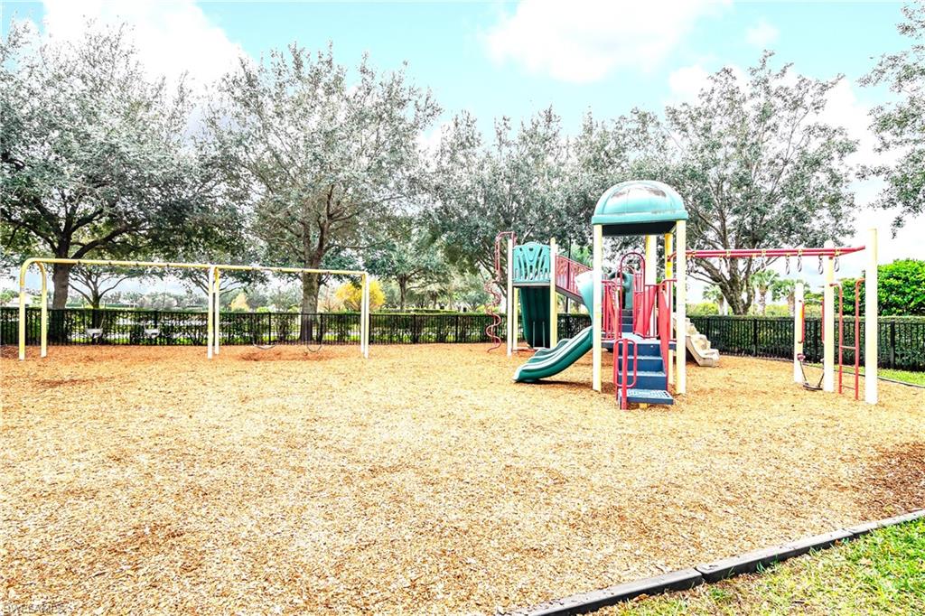 2754 Citrus Street Naples, FL 34120 - Photo 26 of 34 a view of outdoor space with swimming pool