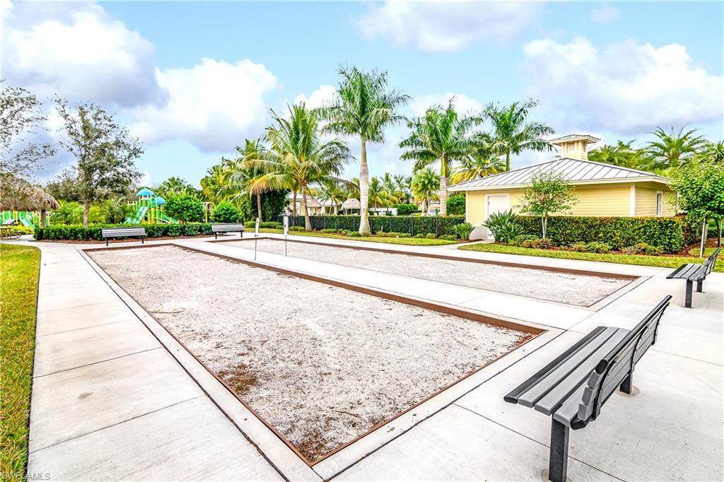 2754 Citrus Street Naples, FL 34120 - Photo 30 of 34 a view of a swimming pool and an outdoor space