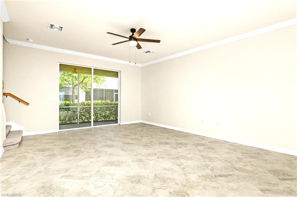 2754 Citrus Street Naples, FL 34120 - Photo 8 of 34 a view of an empty room with a window