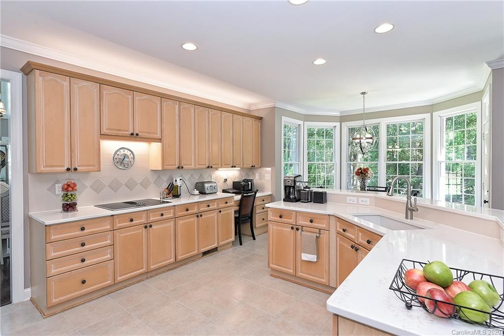 3501 Rhett Butler Place Charlotte, NC 28270 - Photo 11 of 48 a large white kitchen with a large window