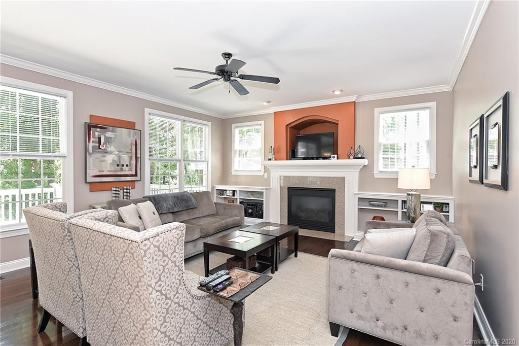 3501 Rhett Butler Place Charlotte, NC 28270 - Photo 14 of 48 a living room with furniture fireplace and a large window