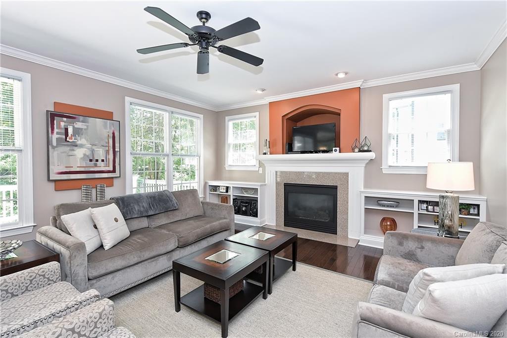 3501 Rhett Butler Place Charlotte, NC 28270 - Photo 15 of 48 a living room with furniture and a fireplace