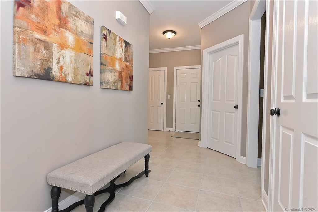 3501 Rhett Butler Place Charlotte, NC 28270 - Photo 18 of 48 a room with a table and a chair
