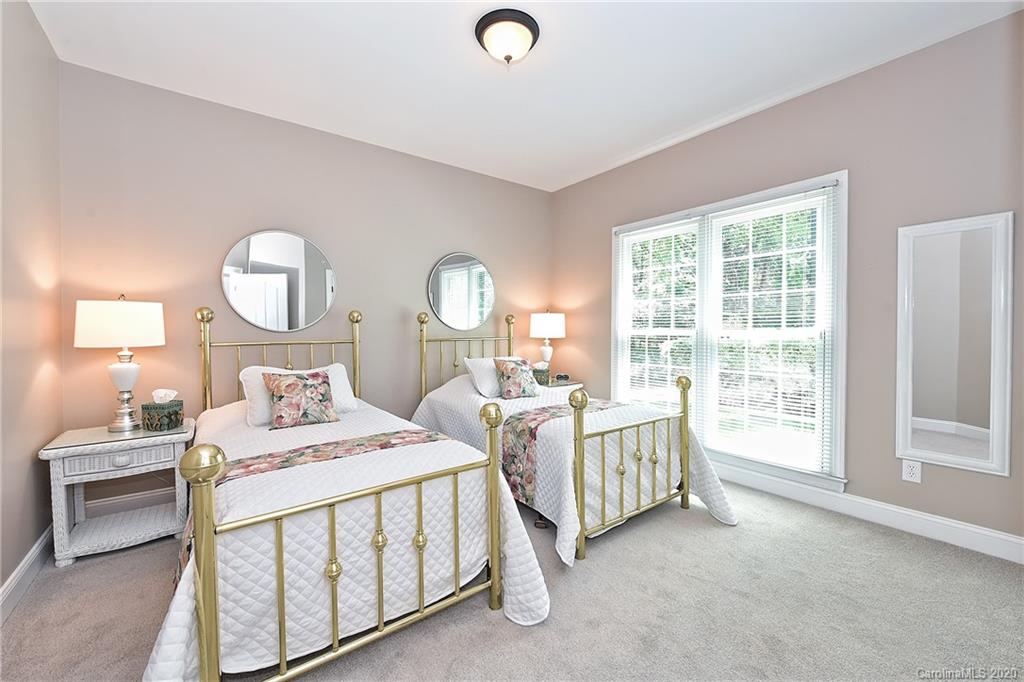 3501 Rhett Butler Place Charlotte, NC 28270 - Photo 19 of 48 a bedroom with 2 bed and a window