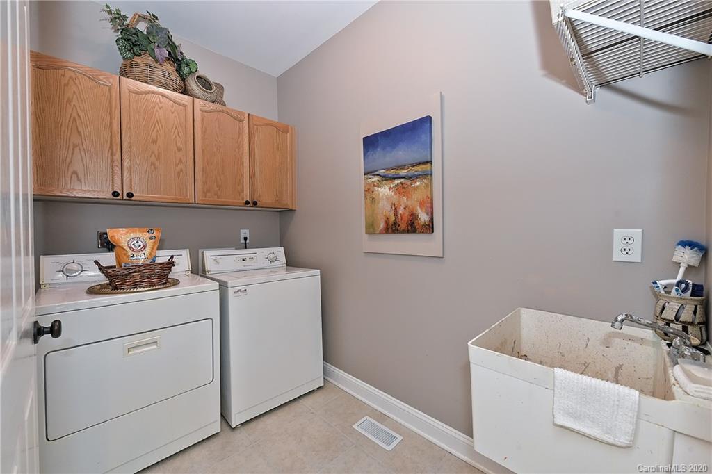 3501 Rhett Butler Place Charlotte, NC 28270 - Photo 21 of 48 a utility room with dryer and washer