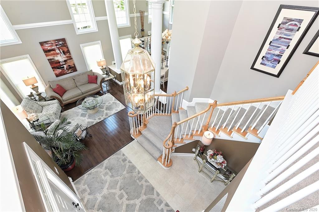 3501 Rhett Butler Place Charlotte, NC 28270 - Photo 22 of 48 a view of living room with furniture and floor to ceiling window