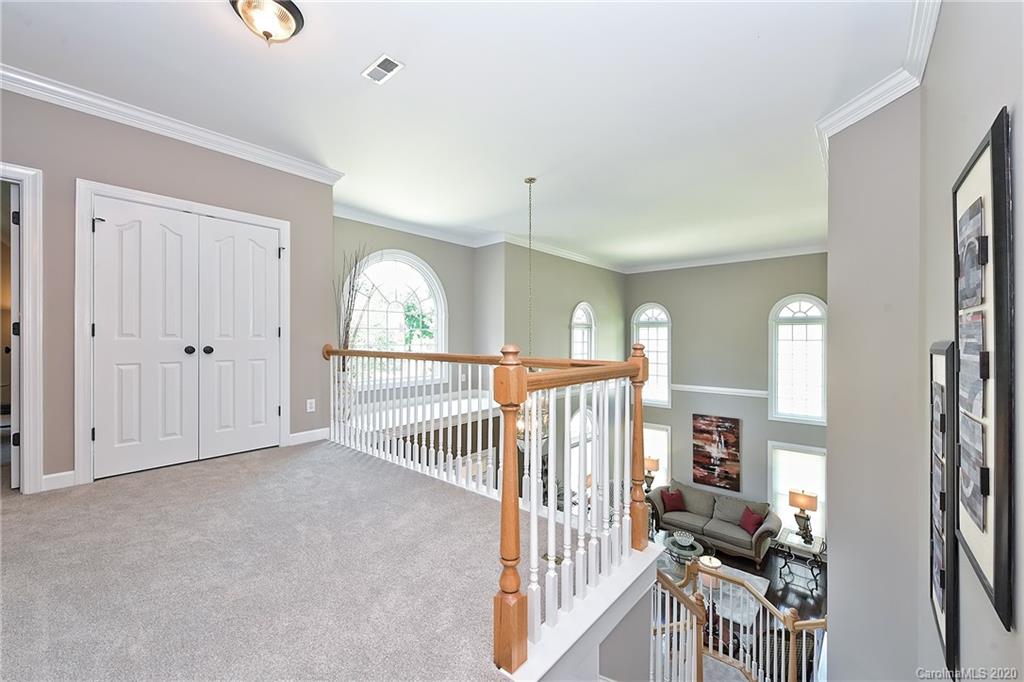 3501 Rhett Butler Place Charlotte, NC 28270 - Photo 23 of 48 a view of a hallway with a livingroom