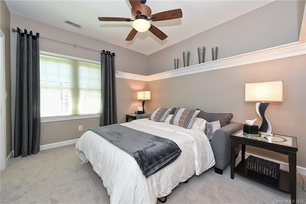 3501 Rhett Butler Place Charlotte, NC 28270 - Photo 29 of 48 a bedroom with a bed and a window