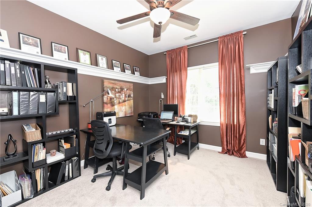 3501 Rhett Butler Place Charlotte, NC 28270 - Photo 31 of 48 a view of a workspace with furniture and a window