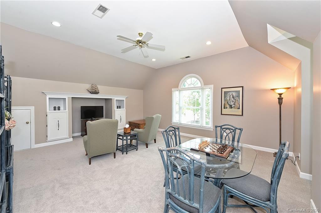 3501 Rhett Butler Place Charlotte, NC 28270 - Photo 32 of 48 a view of a dining room with furniture window and wooden floor