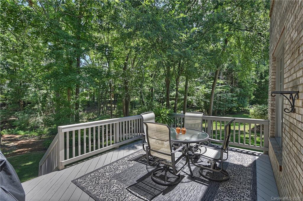 3501 Rhett Butler Place Charlotte, NC 28270 - Photo 33 of 48 a view of a chair and table on the deck