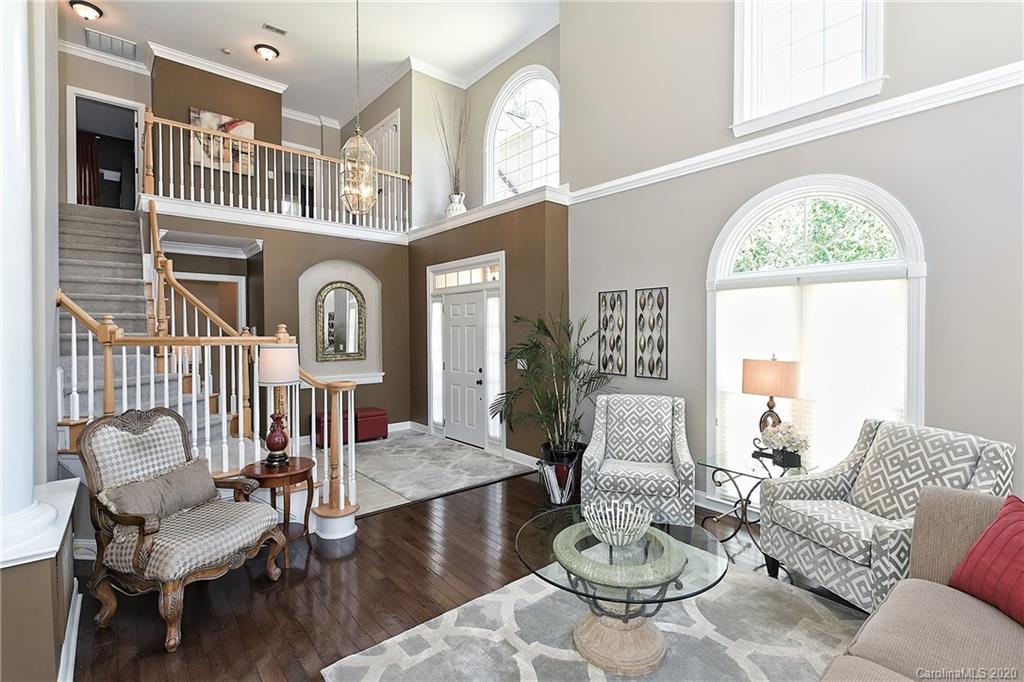 3501 Rhett Butler Place Charlotte, NC 28270 - Photo 5 of 48 a living room with furniture and a large window