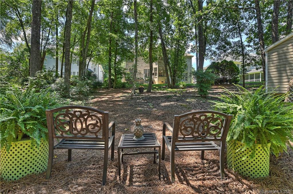 3501 Rhett Butler Place Charlotte, NC 28270 - Photo 42 of 48 a view of a bench in a garden