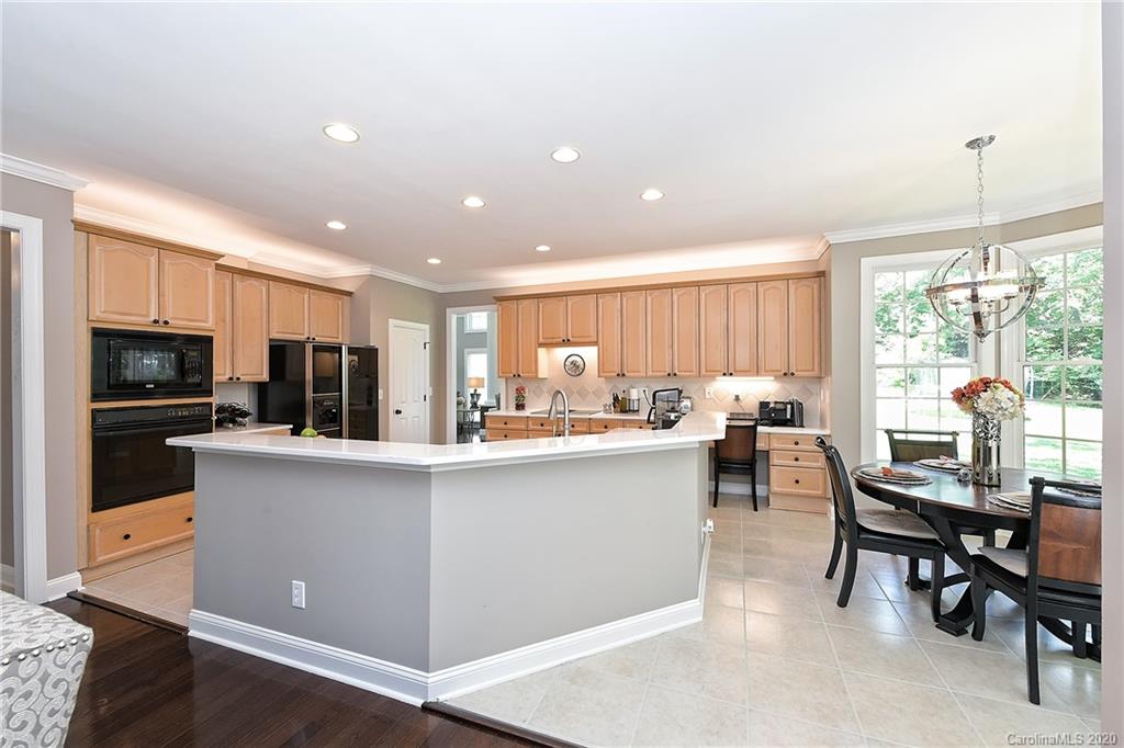 3501 Rhett Butler Place Charlotte, NC 28270 - Photo 9 of 48 a kitchen with counter top space and appliances