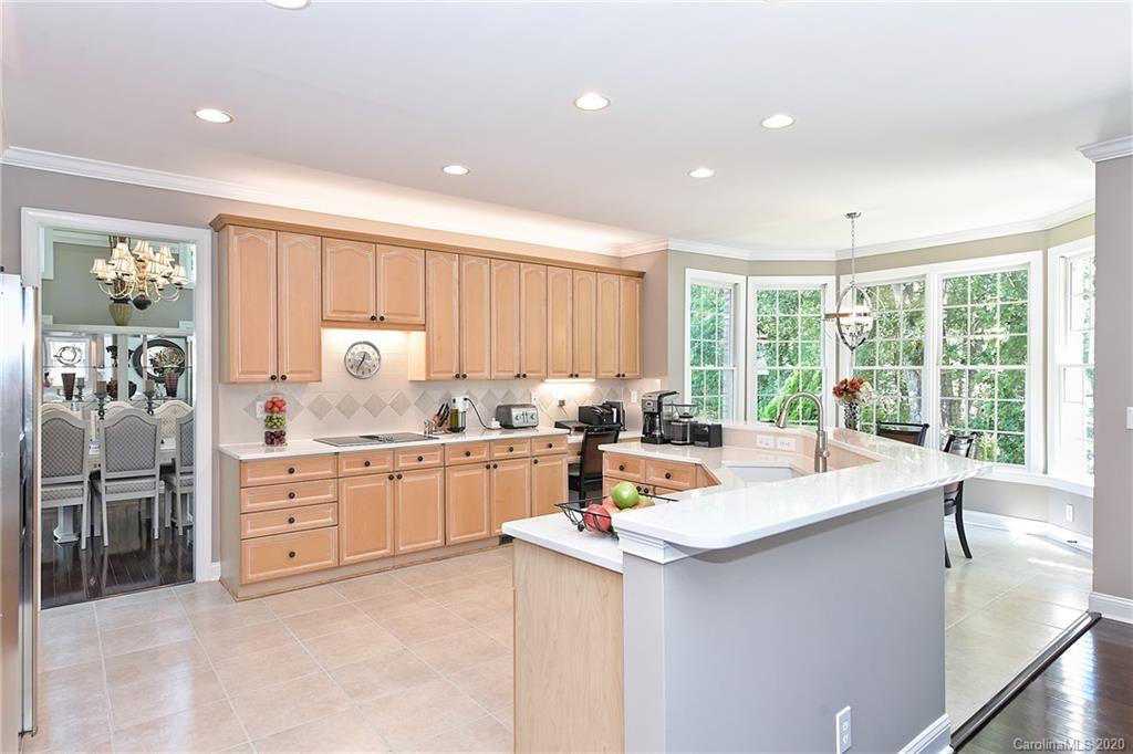 3501 Rhett Butler Place Charlotte, NC 28270 - Photo 10 of 48 a kitchen with sink a stove and refrigerator