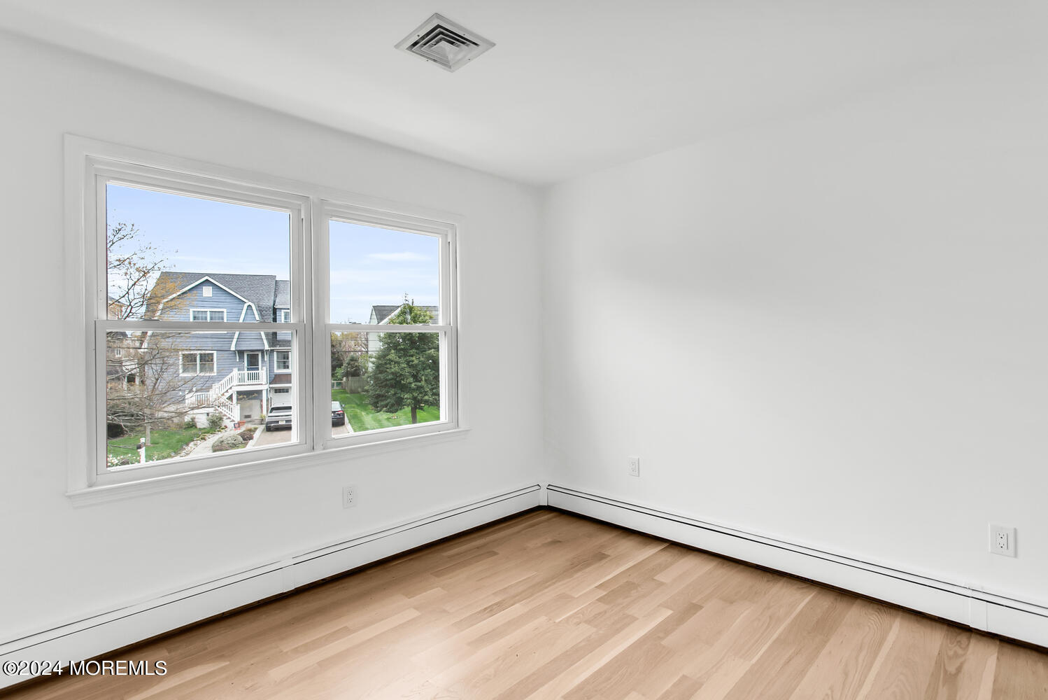 74 Ward Avenue Rumson, NJ 07760 - Photo 13 of 23 an empty room with a window