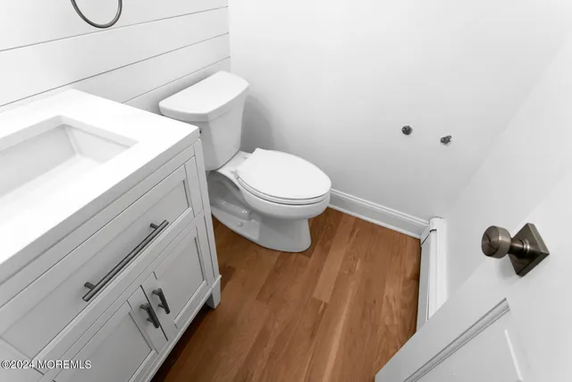 a bathroom with a toilet and a sink