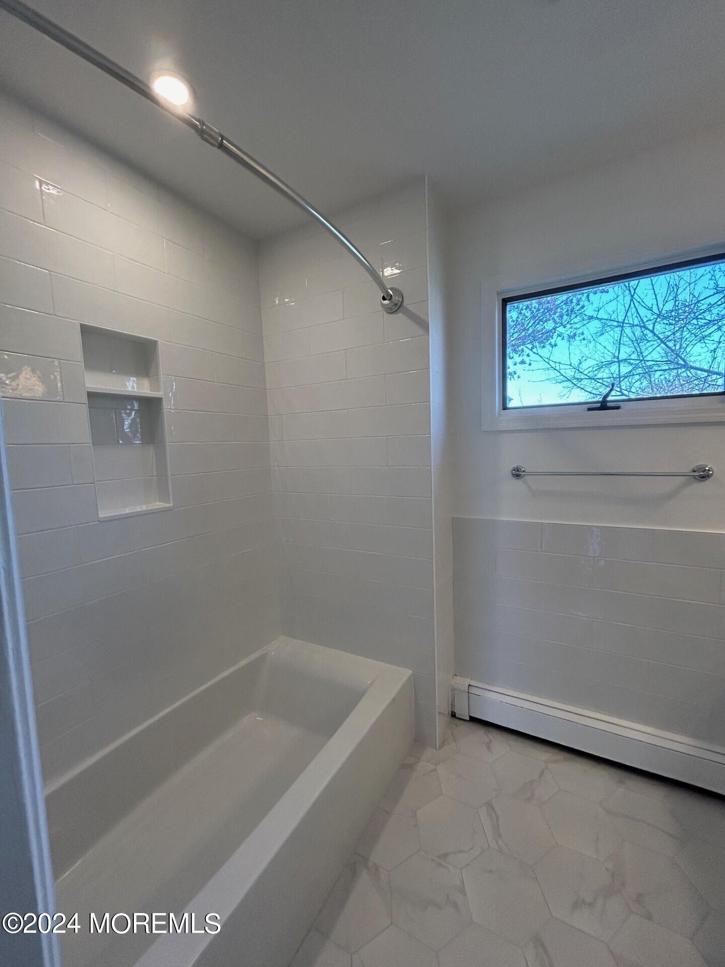 74 Ward Avenue Rumson, NJ 07760 - Photo 20 of 23 a bathroom with a bathtub